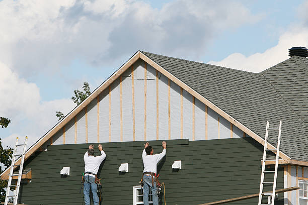 Professional Siding Installation technician working in Hayes, VA